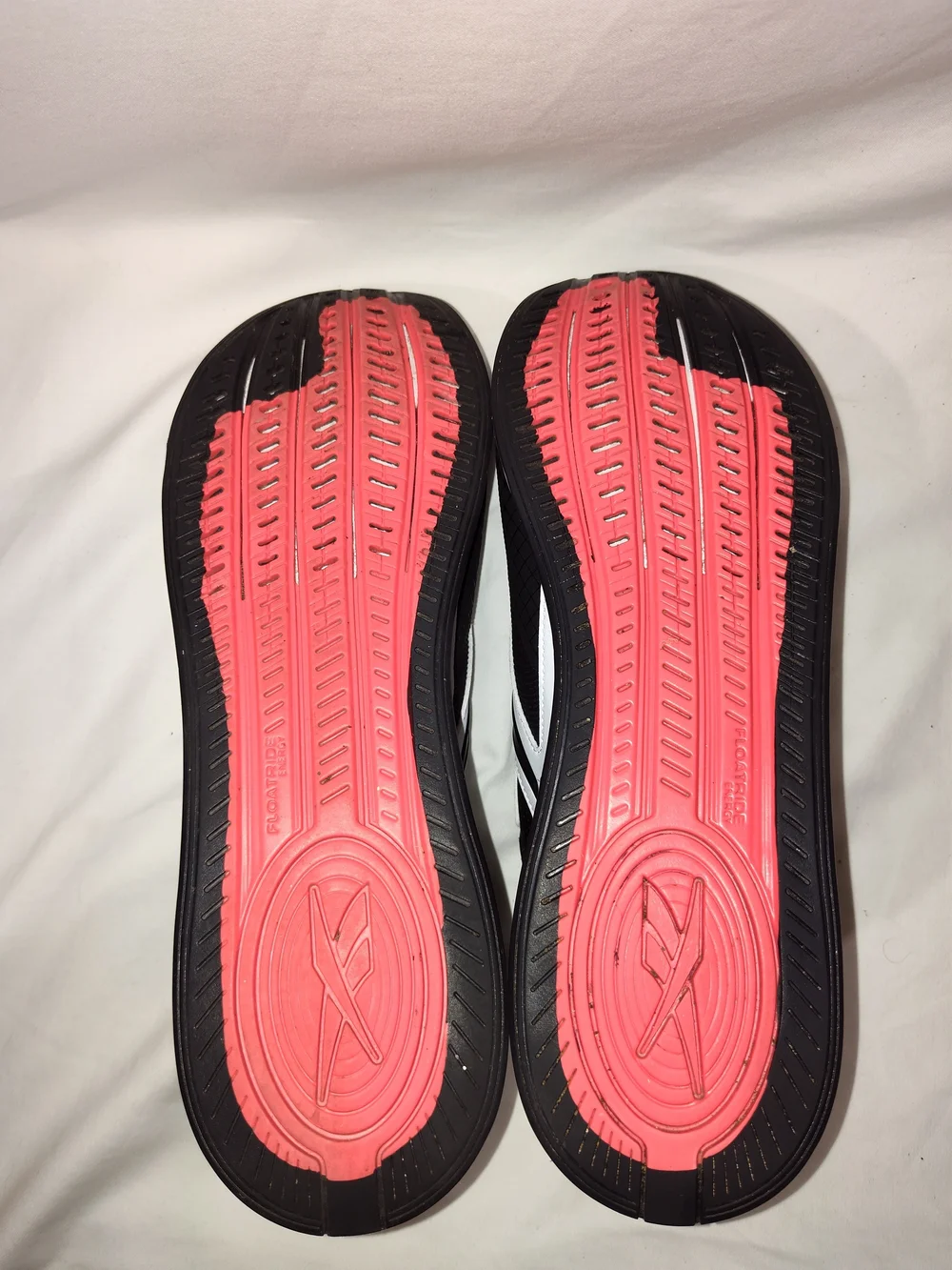 Reebok Men’s Black and White Athletic Slip-On Sneakers